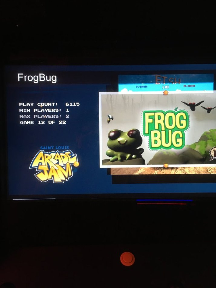 FrogBug title screen on the Saint Louis Arcade Jam cabinet menu showing over 6,000 plays